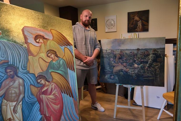 Ukrainian refugee and artist Serhii Kolodka in his studio at Holy Eucharist Ukrainian Catholic Cathedral, where he is putting the finishing touches on two large icons destined for Holy Spirit Parish in New Westminster, British Columbia, Canada.